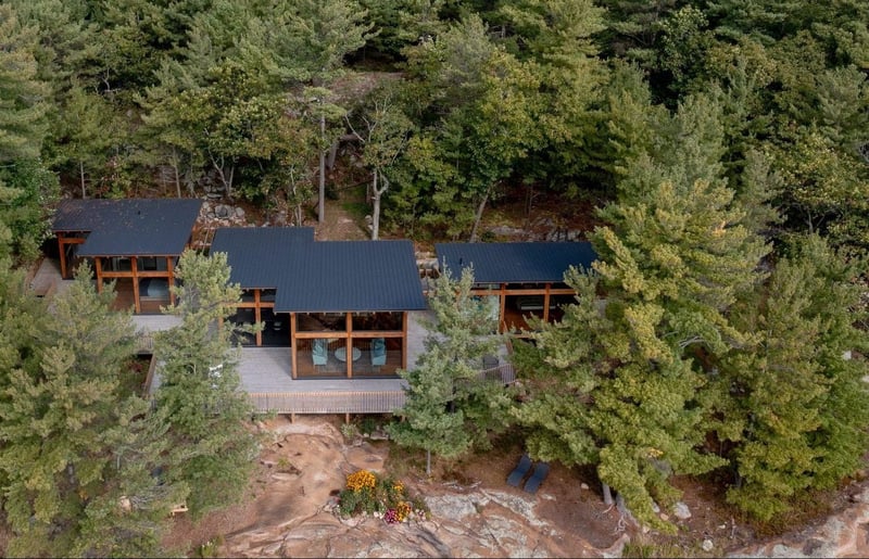 Georgian-Bay-Cottage-Exterior-Aerial-Cottage-Top-View-and-Windows-Normerica-Timber-Homes-e1716558925882